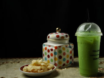 Close-up of dessert against black background