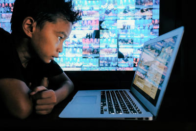 Boy using laptop