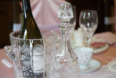 Close-up of wineglasses on table