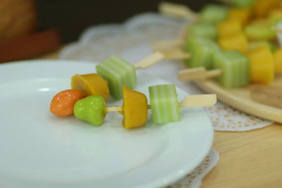 Close-up of chopped vegetables in plate on table