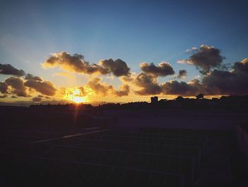 Scenic view of landscape at sunset