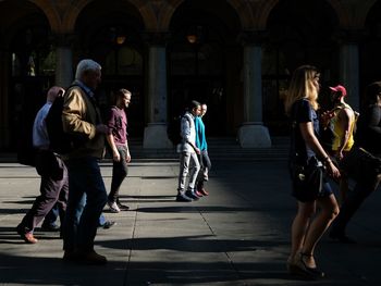 People walking in town square