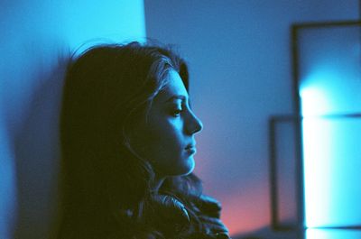 Close-up of thoughtful woman at home