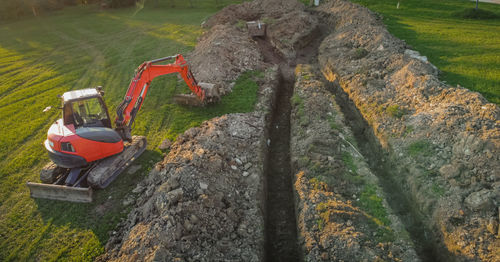 Panoramic view of machinery on field