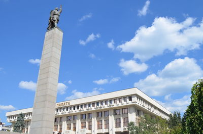 Low angle view of built structure against blue sky