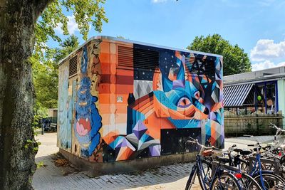 Graffiti on building against sky