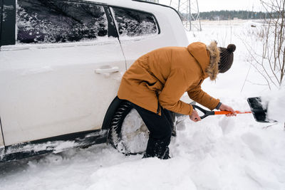 A man digs out