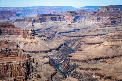 Aerial view of landscape with mountain range in background