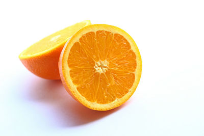 Close-up of lemon against white background