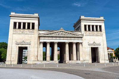 The propylaea at the koenigsplatz in munich on a sunny day