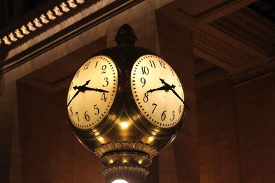 Low angle view of clock