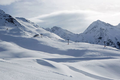 Ski run in austrian alps with sunny weather