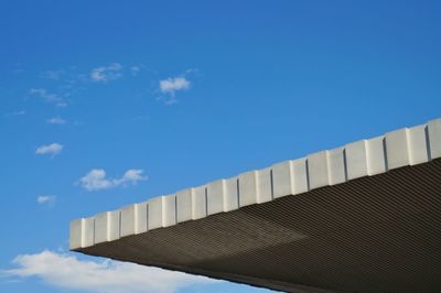 Low angle view of built structure against blue sky