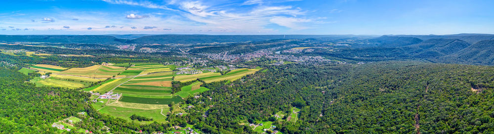 Aerial view of agricultural field against sky