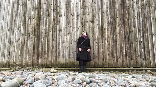 Full length of woman standing in park