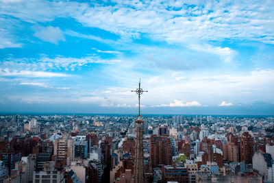High angle view of city and buildings against sky