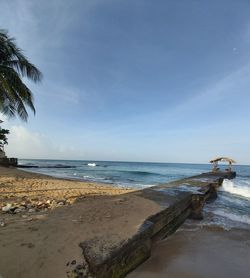 Scenic view of beach against sky