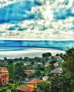 Scenic view of sea against cloudy sky