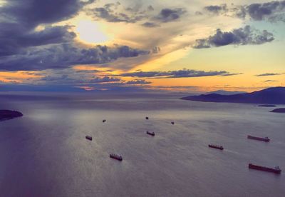 Scenic view of sea against sky at sunset