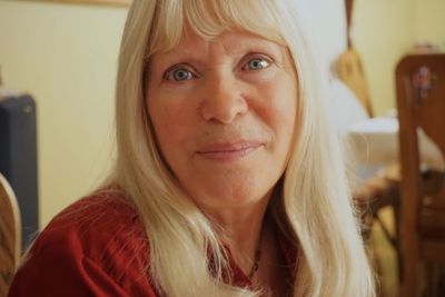 Portrait of smiling woman at home