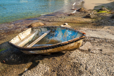 High angle view of abandoned boat on beach