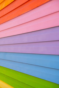 Colorful wooden texture in the colors of rainbow. lgbt pride flag crafted wooden boards. tolerance