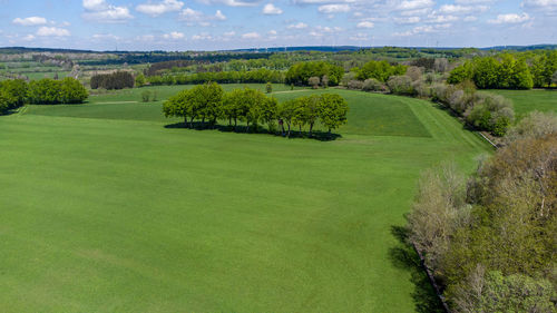 Aerial view of landscape in the eifel region nearby simmerath, germany with trees and green meadows