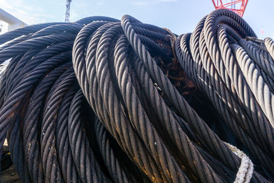 Coil of anchor wire on deck of a construction barge at oilfield