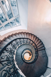 Directly below shot of spiral staircase in building