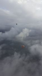 Low angle view of hot air balloon flying in sky