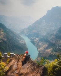 Man looking at mountain range