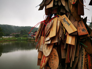 Close-up of traditional hanging by river