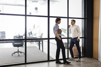 Business colleagues having discussion in office