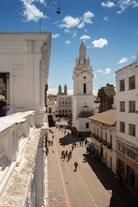 Buildings in city against sky