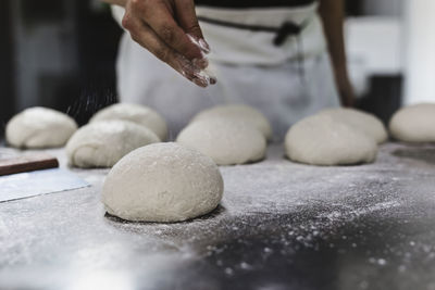 Close-up of person preparing food