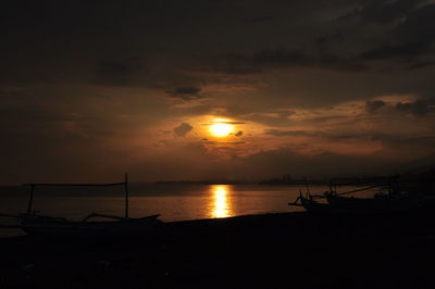 Scenic view of sea at sunset