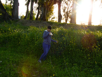 Full length of woman standing on land