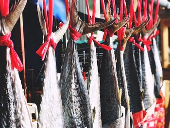 Close-up of flags hanging in temple