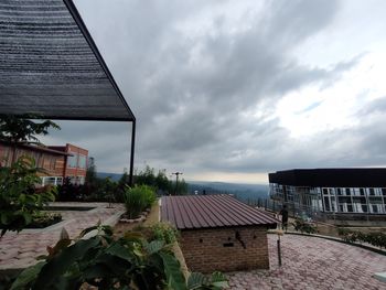 Houses and buildings against sky