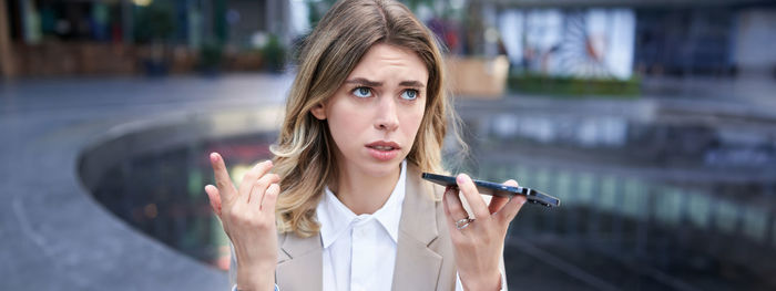 Young woman using mobile phone