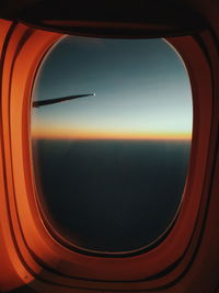 Scenic view of sky seen through airplane window