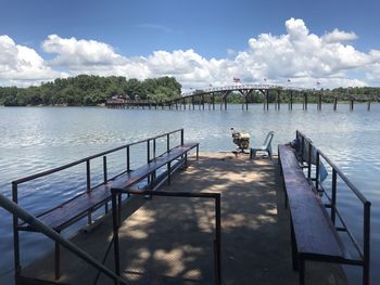 Pier over lake against sky