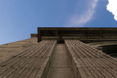 Low angle view of built structure against blue sky