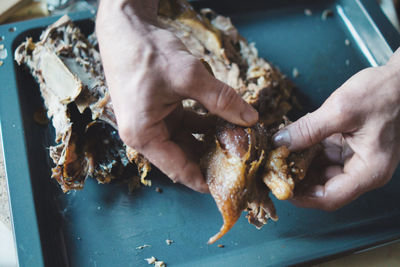 Close-up of hand preparing thanksgiving chick