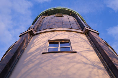 Low angle view of modern building against sky