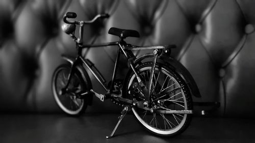 Close-up of bicycle parked on street