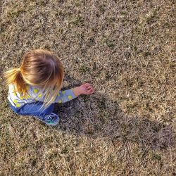 Woman standing on grass