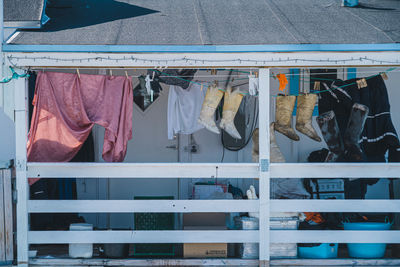 Low angle view of clothes drying on railing