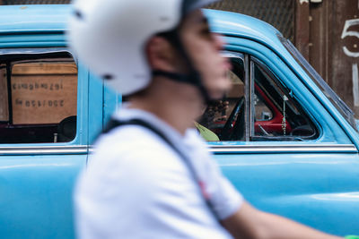 Portrait of man driving car