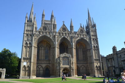 Facade of historic building against clear sky
